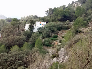 House with painter wall at km 5.5