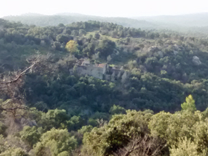 Distant ruin on spur