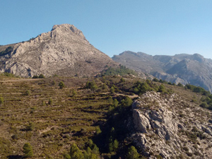 Serrella Castle on high across the col