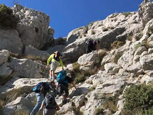 Steep scramble up to summit