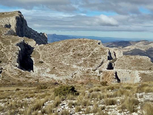 Looking down to the rock cracks below Aitana