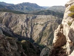 Looking down a gully on  the craggy side