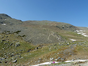 Heading up to the final scree slopes