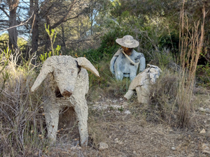 Shepherd and flock sculpture