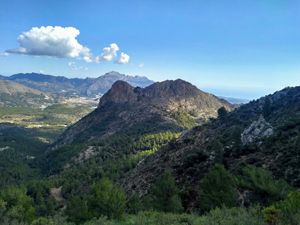 Looking over 2 unnamed peaks towards distant Bernia