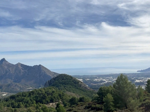 5. Foia Selles lunch stop looking back to Sierra Bernia (L) and Sierra Helada (R) with Penya de l'Or in the foreground